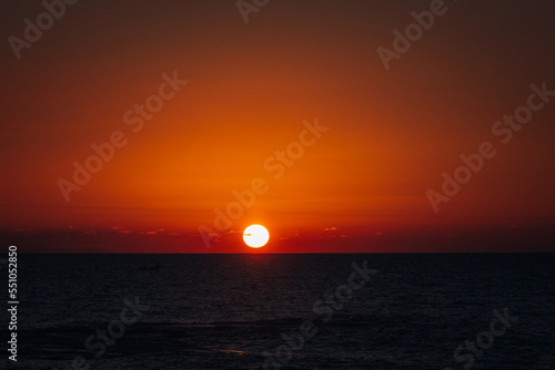 Fototapeta Naklejka Na Ścianę i Meble -  Red sunset over the sea in Latvia
