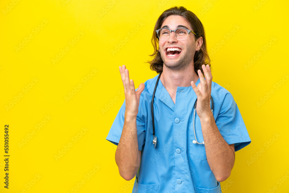 Young surgeon caucasian man isolated on yellow background with surprise facial expression Young surgeon caucasian man isolated on yellow background with surprise facial expression