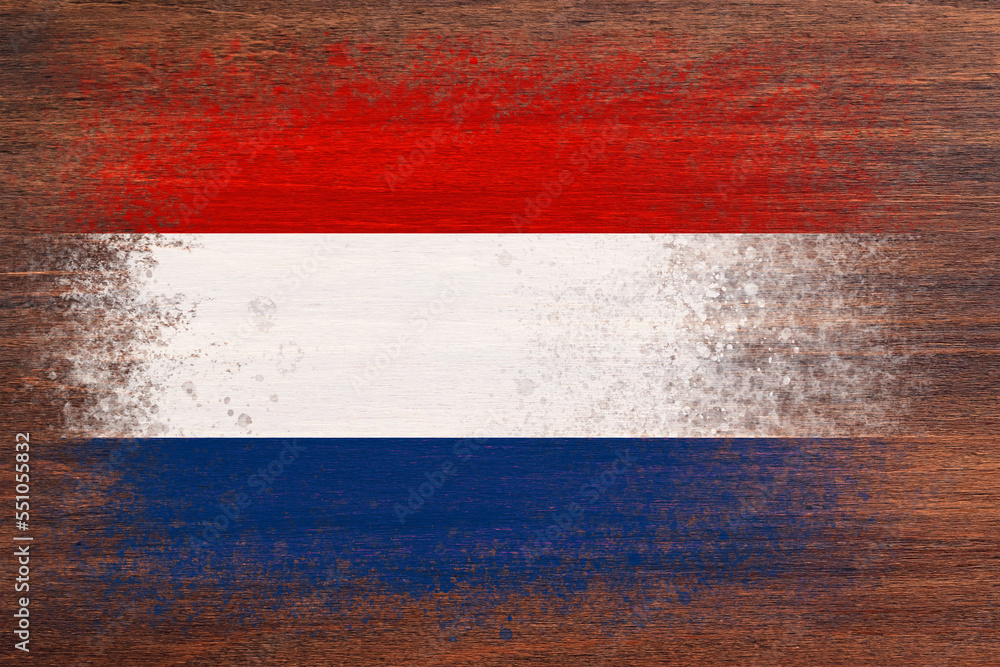Flag of Netherlands. Flag is painted on a wooden surface. Wooden background. Plywood surface. Copy space. Textured background Flag of Netherlands. Flag is painted on a wooden surface. Wooden background. Plywood surface. Copy space. Textured background