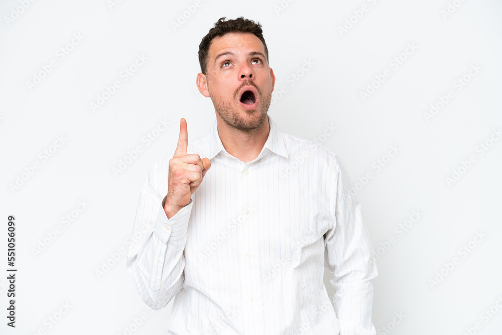 Young caucasian handsome man isolated on white background thinking an idea pointing the finger up Young caucasian handsome man isolated on white background thinking an idea pointing the finger up