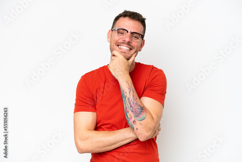 Young caucasian handsome man isolated on white background happy and smiling
