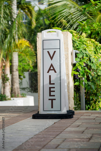 Floor-mounted Valet signage on a bricks pavement- Miami, Florida