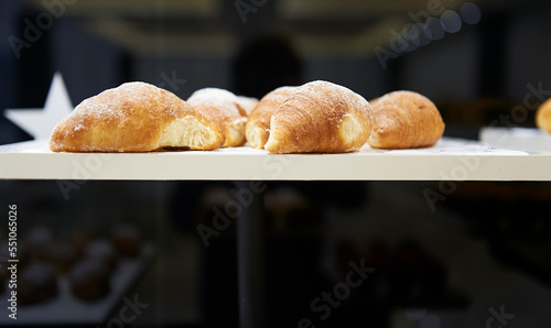 croissants on a display stand ready for breakfast photo