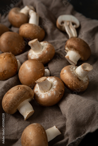 Close up of Raw fresh shiitake mushrooms  on textile vegan food