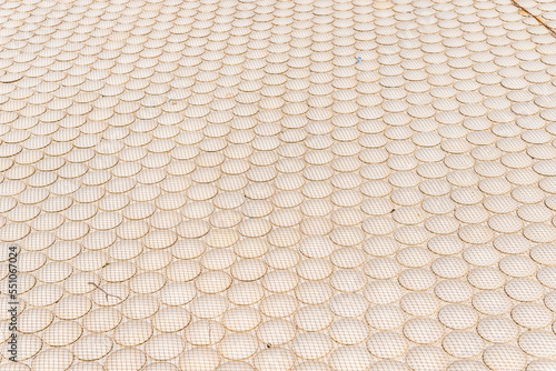 Circular abstract texture of building material used as the roof of a building