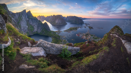 sunset from the top of the mountain at reinebringen, lofoten islands photo