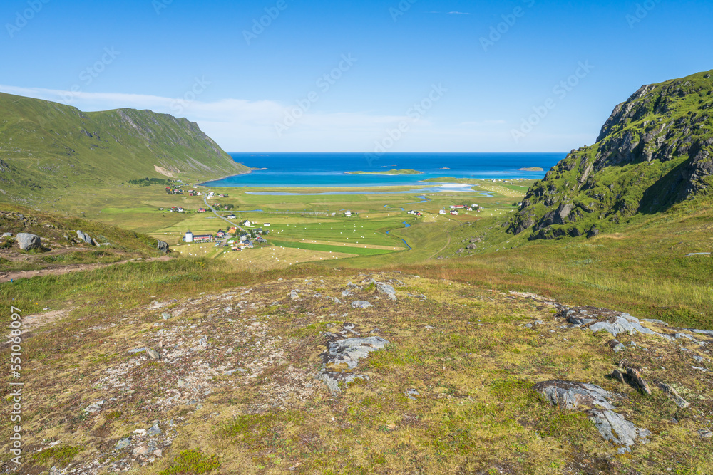 hiking mount ryten and kvalvika beach on lofoten islands in norway hiking mount ryten and kvalvika beach on lofoten islands in norway