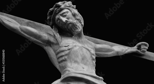 Wooden anciant statue of Holy cross with crucified Jesus Christ. photo