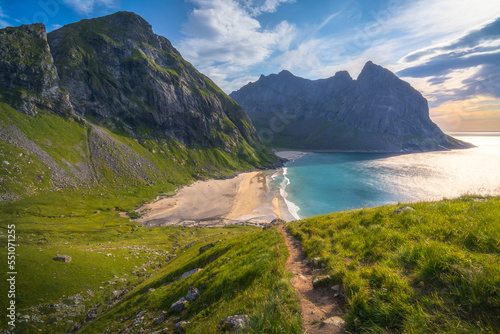 hiking mount ryten and kvalvika beach on lofoten islands in norway photo