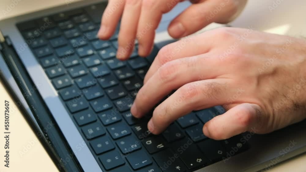 Male hands of business woman professional user worker using typing on laptop notebook keyboard sit at home office desk working online with pc software apps technology concept, close up side view Male hands of business woman professional user worker using typing on laptop notebook keyboard sit at home office desk working online with pc software apps technology concept, close up side view