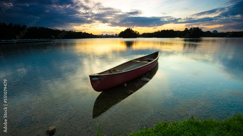 Fototapeta Blue hour view of the Dam scenery during sunrise at putrajaya lake.