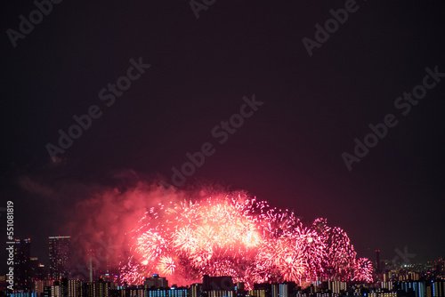 View of fireworks during a summer festival with a clear sky night (Toyonaka, Osaka, Japan) (20221203-009) © Pablo