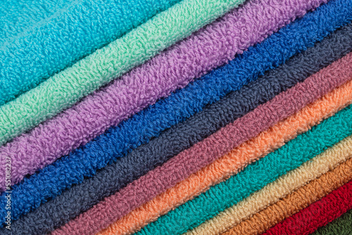 multi-colored Terry cotton bath towels, isolate on a white background

