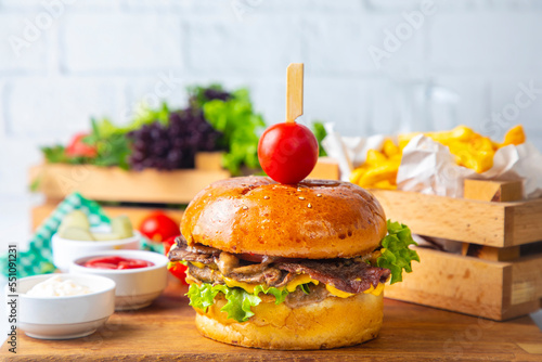 Homemade hamburger served w...
