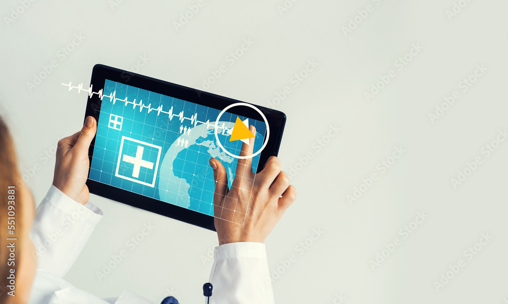 Close of female doctor hands working with tablet pc computer Close of female doctor hands working with tablet pc computer