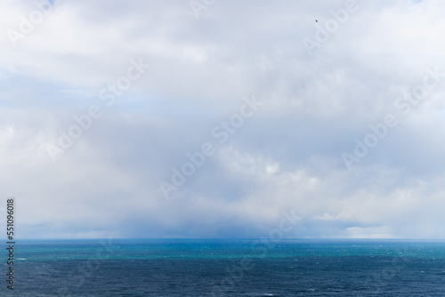 Blue Baltic Sea water is under cloudy sky on a c cloudy day © evannovostro