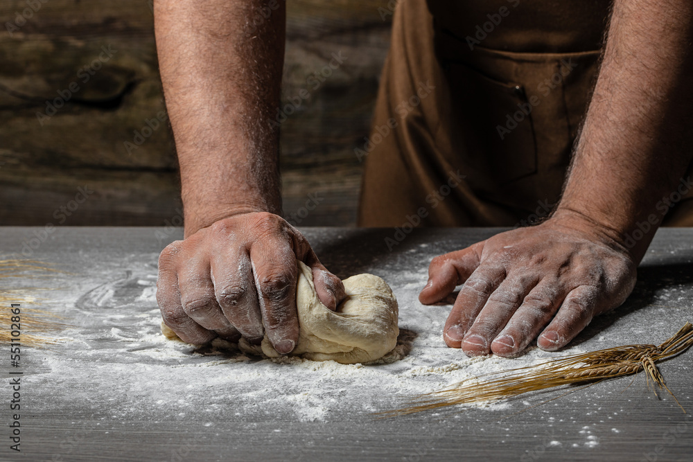 Kneading the Dough, hands making dough for pizza or bread