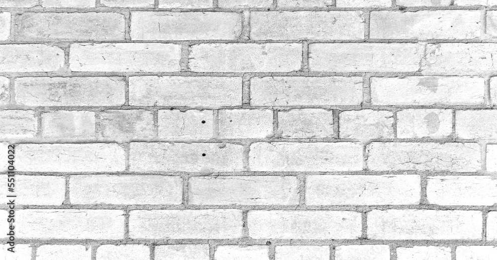 Old white grunge brick wall texture or background.