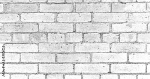 Old white grunge brick wall texture or background.
