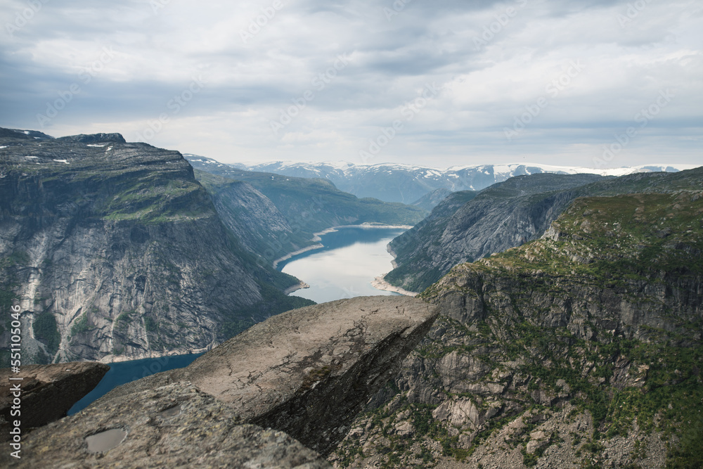 Trolltunga, view on troll tongue reef over the lake. Beautiful nature. Tourist popular place. Ringedalsvatnet, Odda, Norway. 