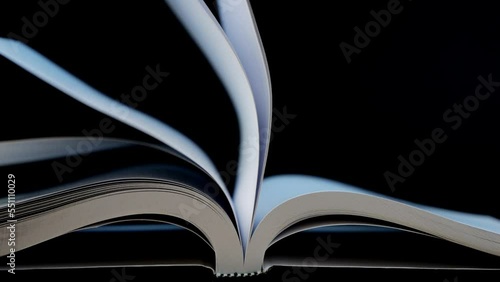 4K-Slow motion of book flip fast and pages move from side to side, Education and business concept.