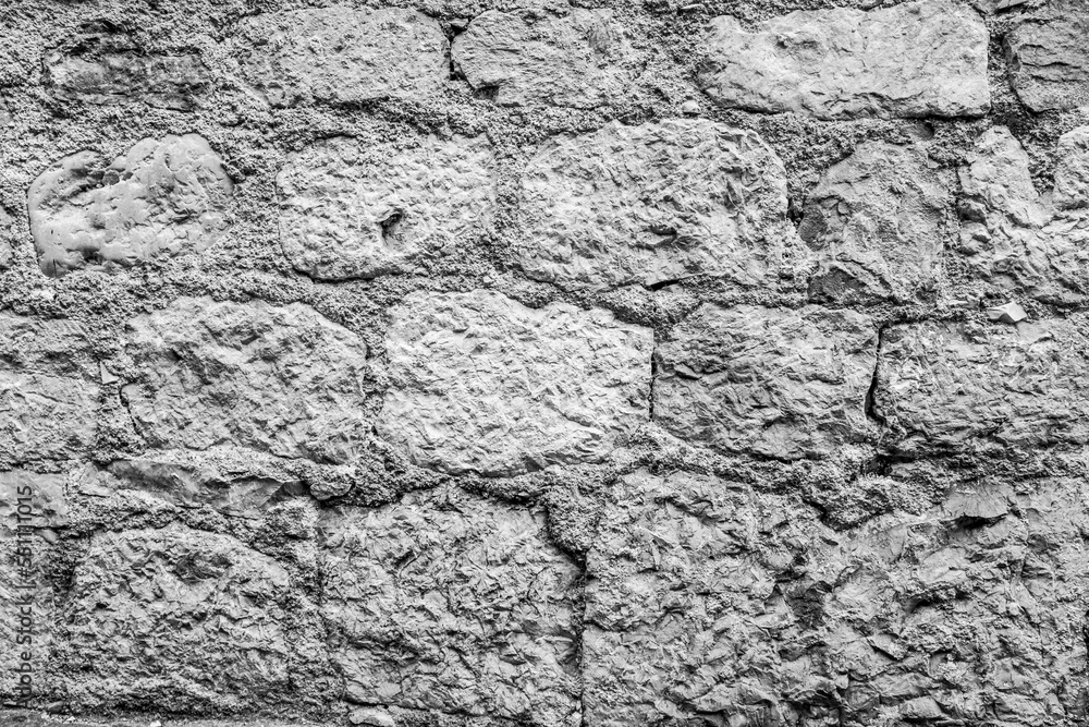 Stone wall for backdrop design, close-up. Natural texture from big stones for publication, poster, calendar, post, screensaver, wallpaper, postcard, banner, website. High quality photo Stone wall for backdrop design, close-up. Natural texture from big stones for publication, poster, calendar, post, screensaver, wallpaper, postcard, banner, website. High quality photo