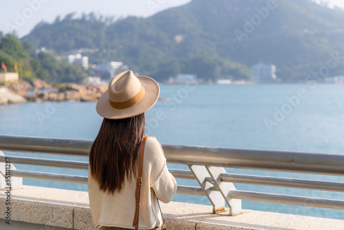 Rear view of woman look at the sea in Stanley of Hong Kong © leungchopan