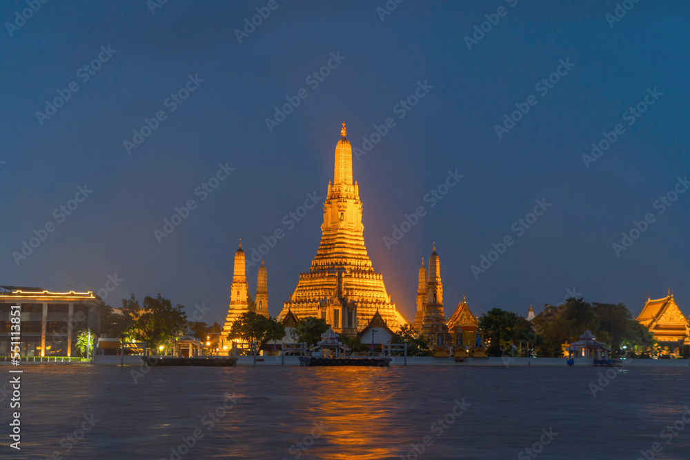 Temple of Dawn or Wat Arun with reflection of Chao Phraya River in Rattanakosin Island in architecture, Urban old town city, Bangkok skyline. downtown area, Thailand at night. Temple of Dawn or Wat Arun with reflection of Chao Phraya River in Rattanakosin Island in architecture, Urban old town city, Bangkok skyline. downtown area, Thailand at night.