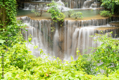 Fototapeta Naklejka Na Ścianę i Meble -  Erawan Waterfall. Nature landscape of Kanchanaburi district in natural area. it is located in Thailand for travel trip on holiday and vacation background, tourist attraction.