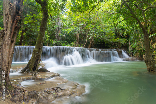 Fototapeta Naklejka Na Ścianę i Meble -  Erawan Waterfall. Nature landscape of Kanchanaburi district in natural area. it is located in Thailand for travel trip on holiday and vacation background, tourist attraction.