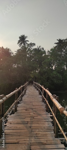 wooden bridge over the river