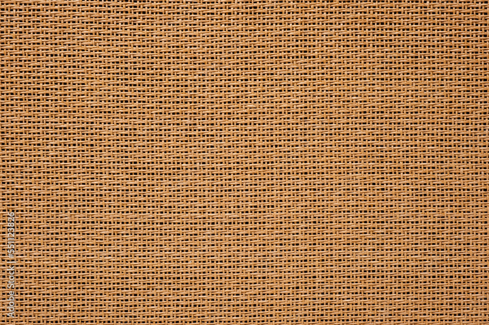 The texture of the fabric on the front panel of the combo amplifier for acoustic and electric guitars with a vintage look. The texture of the fabric on the front panel of the combo amplifier for acoustic and electric guitars with a vintage look.