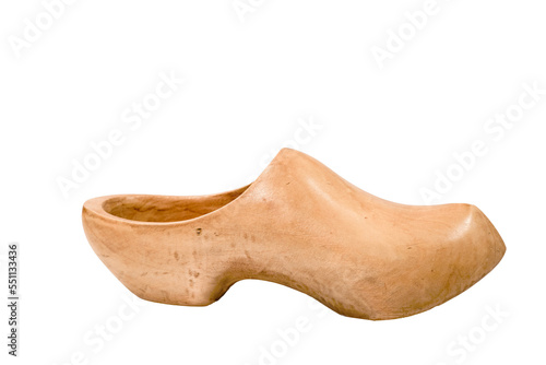 Dutch wooden vintage clog isolated on white background in studio photo