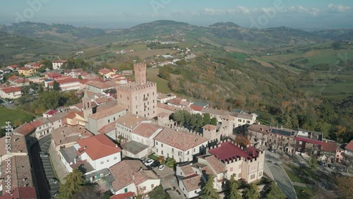 aerial view 4k 24 fps of the medieval village of Tavoleto in the province of Pesaro Urbino Marche region Italy
 photo