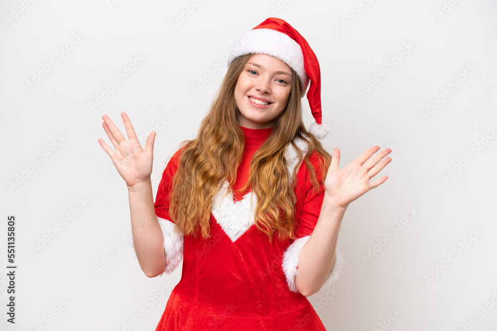 Young caucasian woman with Christmas dress isolated on white background counting ten with fingers Young caucasian woman with Christmas dress isolated on white background counting ten with fingers
