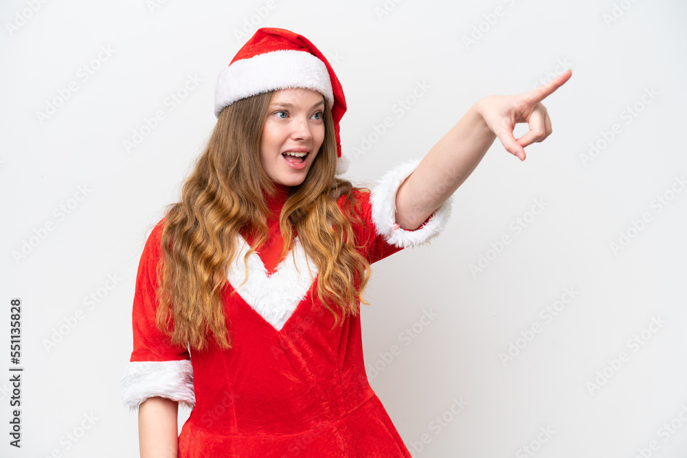 Young caucasian woman with Christmas dress isolated on white background pointing away Young caucasian woman with Christmas dress isolated on white background pointing away
