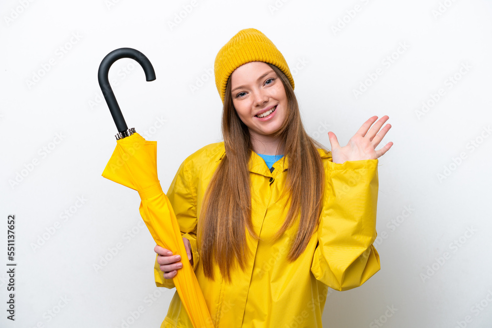 Young caucasian woman with rainproof coat and umbrella isolated on white background counting five with fingers Young caucasian woman with rainproof coat and umbrella isolated on white background counting five with fingers