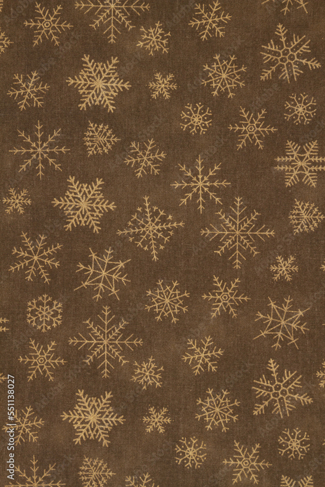 Brown and gold snowflake winter background