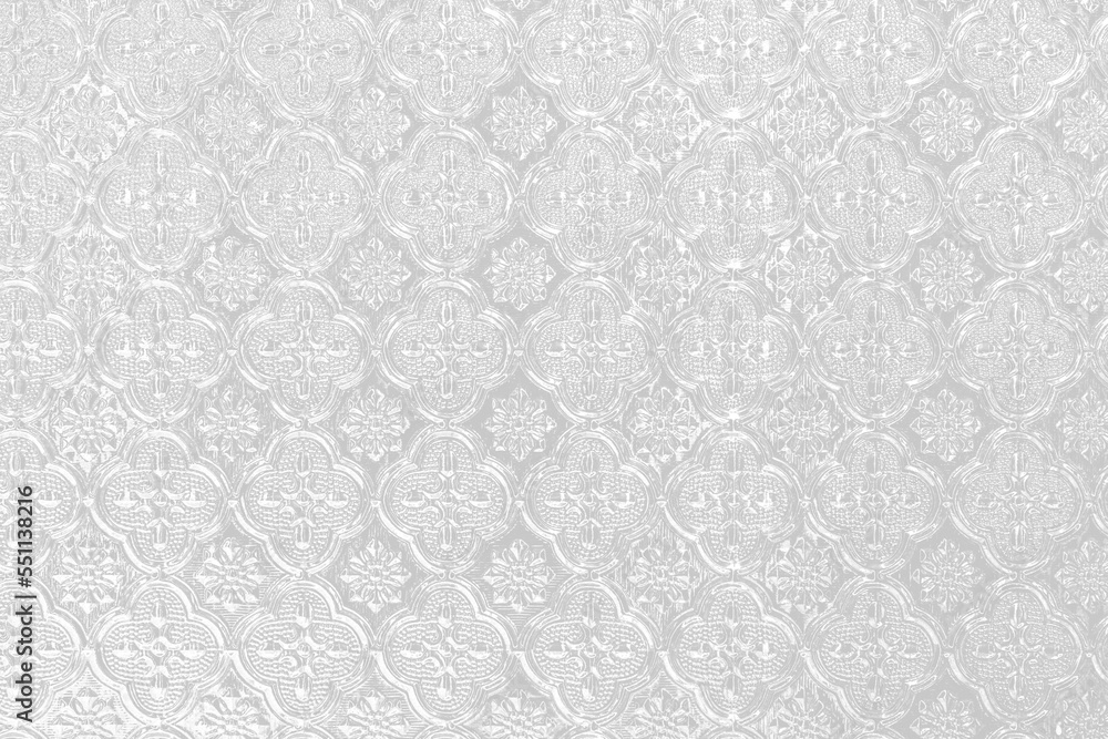Pattern on white window glass in classic background.