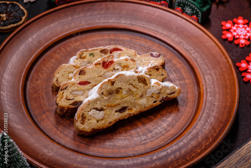 Tasty christmas stollen with marzipans, dried fruits and nuts