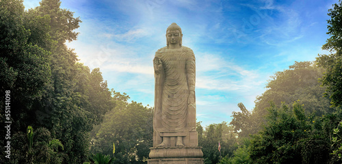 Big statue of Gautam Buddha in evening photo