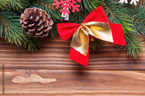 beautiful branches of the Christmas tree with cones and toys