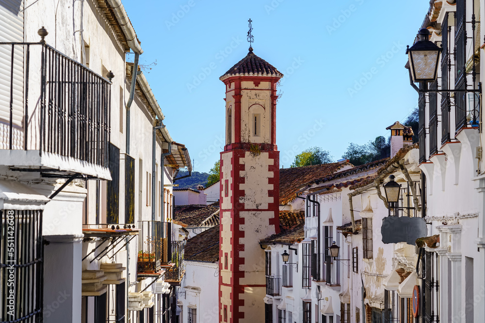 White houses and church tower in the picturesque mountain village of Grazalema Cadiz, Spain.