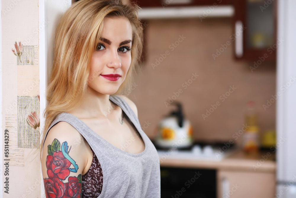 Pretty girl posing at camera in retro apartment. Emotion.Life style. Kitchen. Relationship. Pretty girl posing at camera in retro apartment. Emotion.Life style. Kitchen. Relationship.
