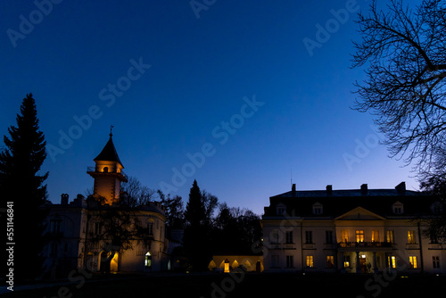 Colorful dramatic sky during sunset over the old palace. Deep blue gradient sky over the building. © Fotoforce