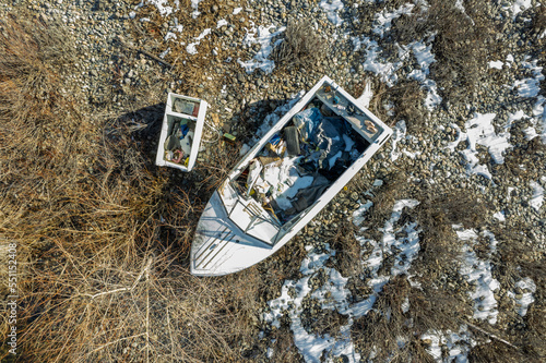Abandoned boat on shore