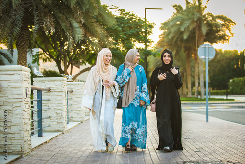 Photography Arabic women wearing traditional middle eastern abaya clothing in Dubai, shoppin