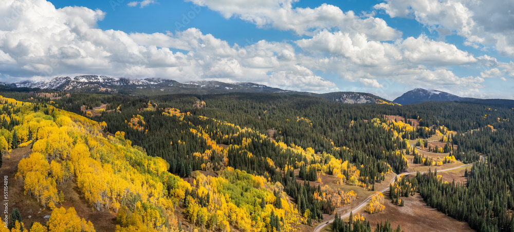 Fototapeta premium Autumn sunset colors in the Colorado Rocky Mountains - near Crested Butte on scenic Gunnison County Road 12 through the Kebler Pass
