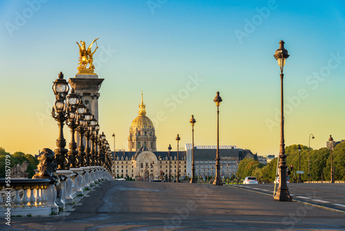 Dome of Les Invalides seen across Pont Alexandre III bridge at sunrise in Paris. France © Pawel Pajor