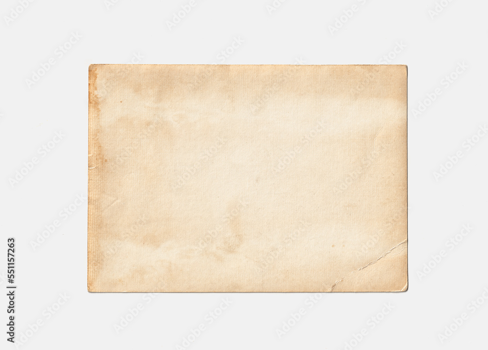 Old brown paper on white background. Vintage wallpaper. Ancient map texture